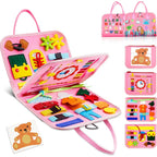 Tablero de actividades rosa abierto con reloj, cierres, hebillas y stickers
