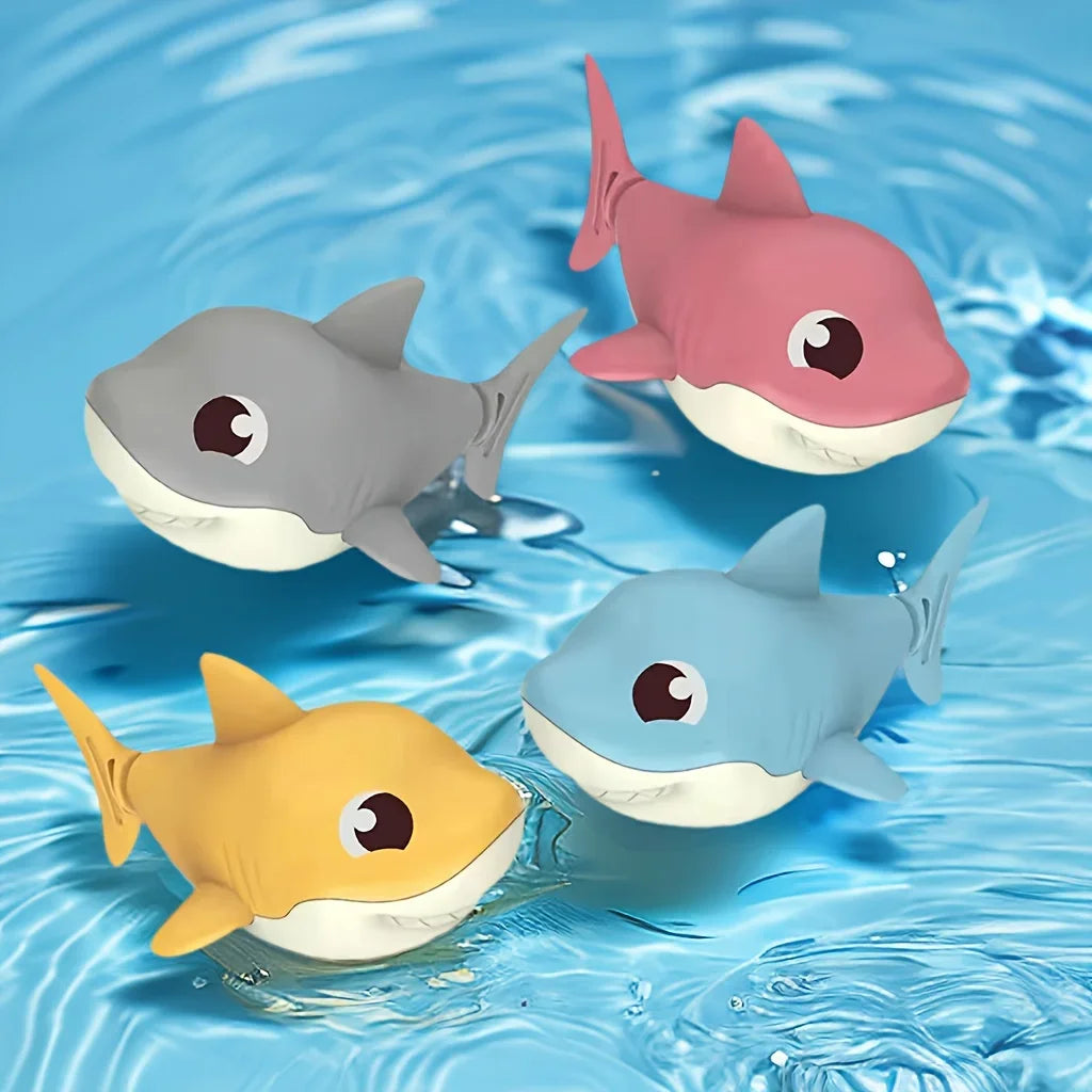 Los cuatro tiburones de cuerda nadando en la tina
