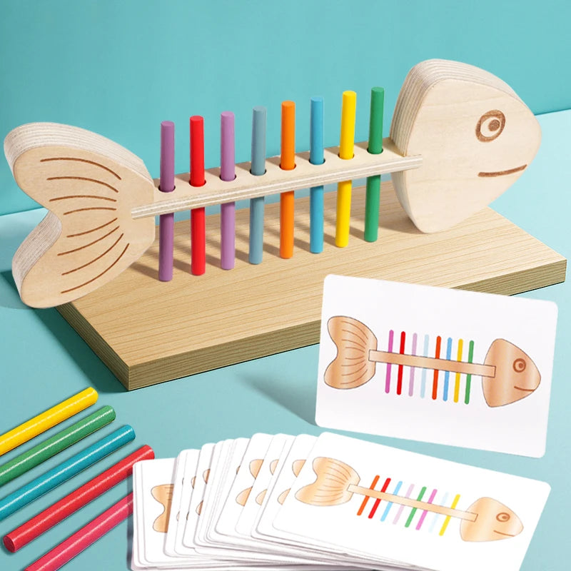 Juego de equilibrio del pez con los palitos de colores colocados y sus tarjetas
