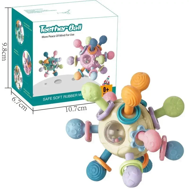 Pelota mordedor sensorial en tonos beige y azul junto a su caja