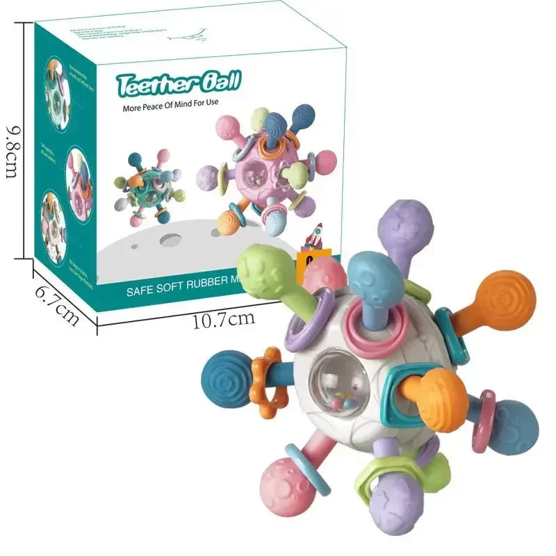 Pelota mordedor sensorial en tonos pastel junto a su caja con las medidas