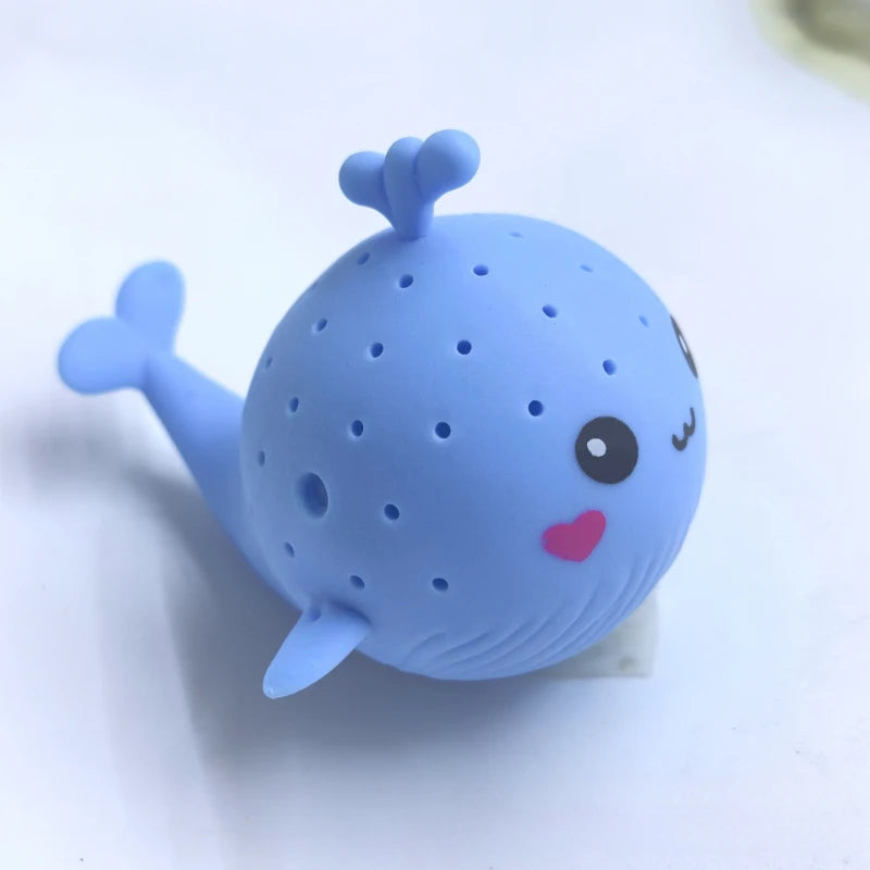 Ballenita de baño azul con sus orificios para salpicar