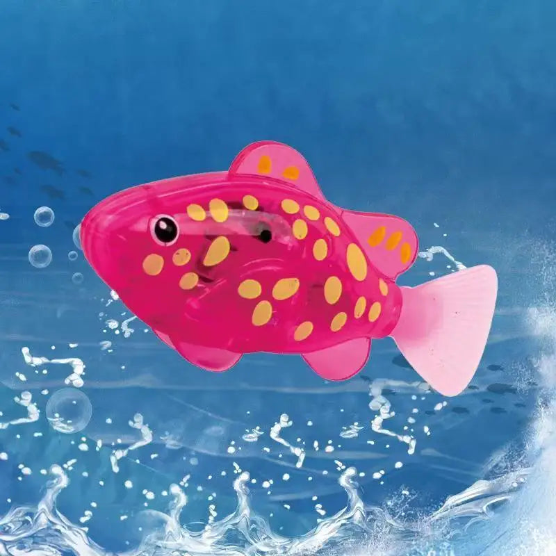 Pececito rosa con puntos amarillos nadando en el agua